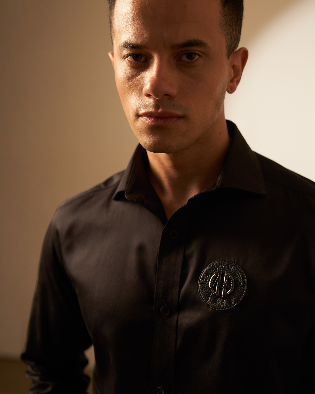 Black Shirt with Embroidered Badge