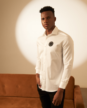 White Shirt with Embroidered Badge