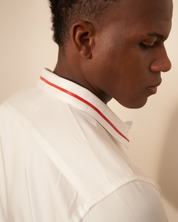 The Red Collar White Shirt